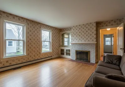 The same living room today, before